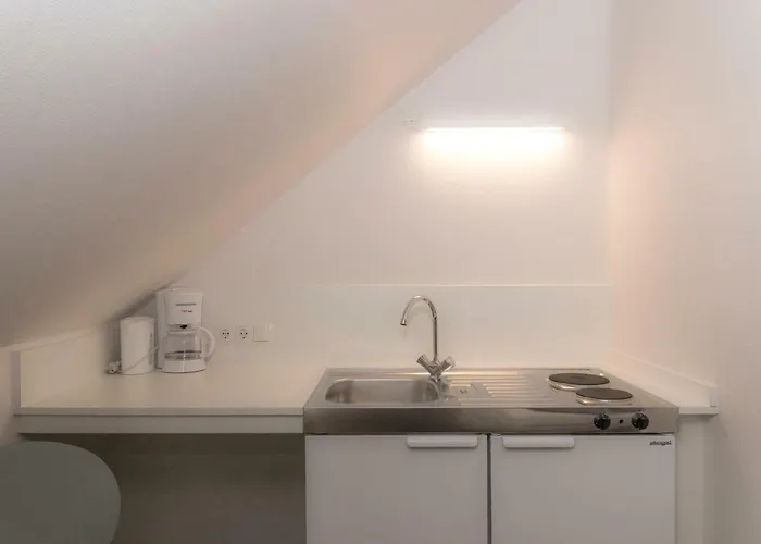 Zum Schloss Gæstehus